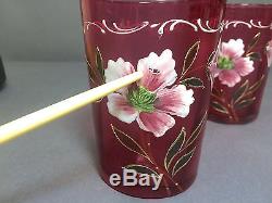 A Pair of Victorian Cranberry Glass Floral Enamel Decorated Tumblers
