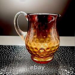 American Victorian Art Glass Amberina Inverted Thumbprint Pitcher. 7 Height