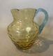 Antique Victorian Art Glass Thumbprint Pitcher With Blue Applied Glass Handle