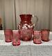 Antique Victorian Cranberry Glass Enameled Floral Pitcher And Tumblers Water Set