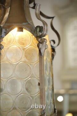 Arts & Crafts copper lantern with bullseye glass