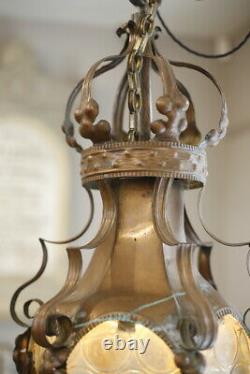 Arts & Crafts copper lantern with bullseye glass