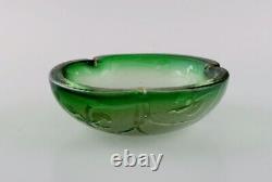 Daum Nancy, France. Art Nouveau bowl in green art glass. Ca 1900