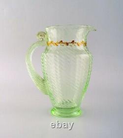 Emile Gallé (1846-1904). Early and rare jug in mouth-blown light green art glass