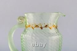 Emile Gallé (1846-1904). Early and rare jug in mouth-blown light green art glass