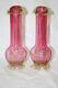 Pair 1880s Victorian Hand Blown Cranberry Glass Ribbed Vases With Uranium Base/top