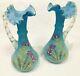 Pair Victorian Art Glass Bohemian Satin Blue Ewer Pitchers Violet Flowers