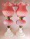 Pair Of Fenton Art Glass Cranberry Opalescent Coin Dot Lamps With Matching Shades