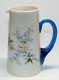 Victorian Opaque Glass Heavy Enamel Decorated Pitcher Withblue Handle