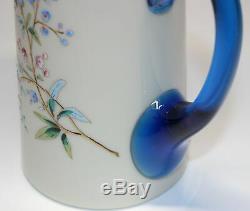 VICTORIAN OPAQUE GLASS HEAVY ENAMEL DECORATED PITCHER WithBLUE HANDLE