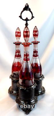 Victorian Art Glass Ruby Stained Triple Wine Decanter Set Silver Caddy c. 1850 Victorian Art Glass Ruby Stained Triple Wine Decanter Set Silver Caddy c. 1850